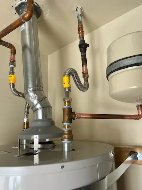 Water heater installation and plumbing repair in Astor
